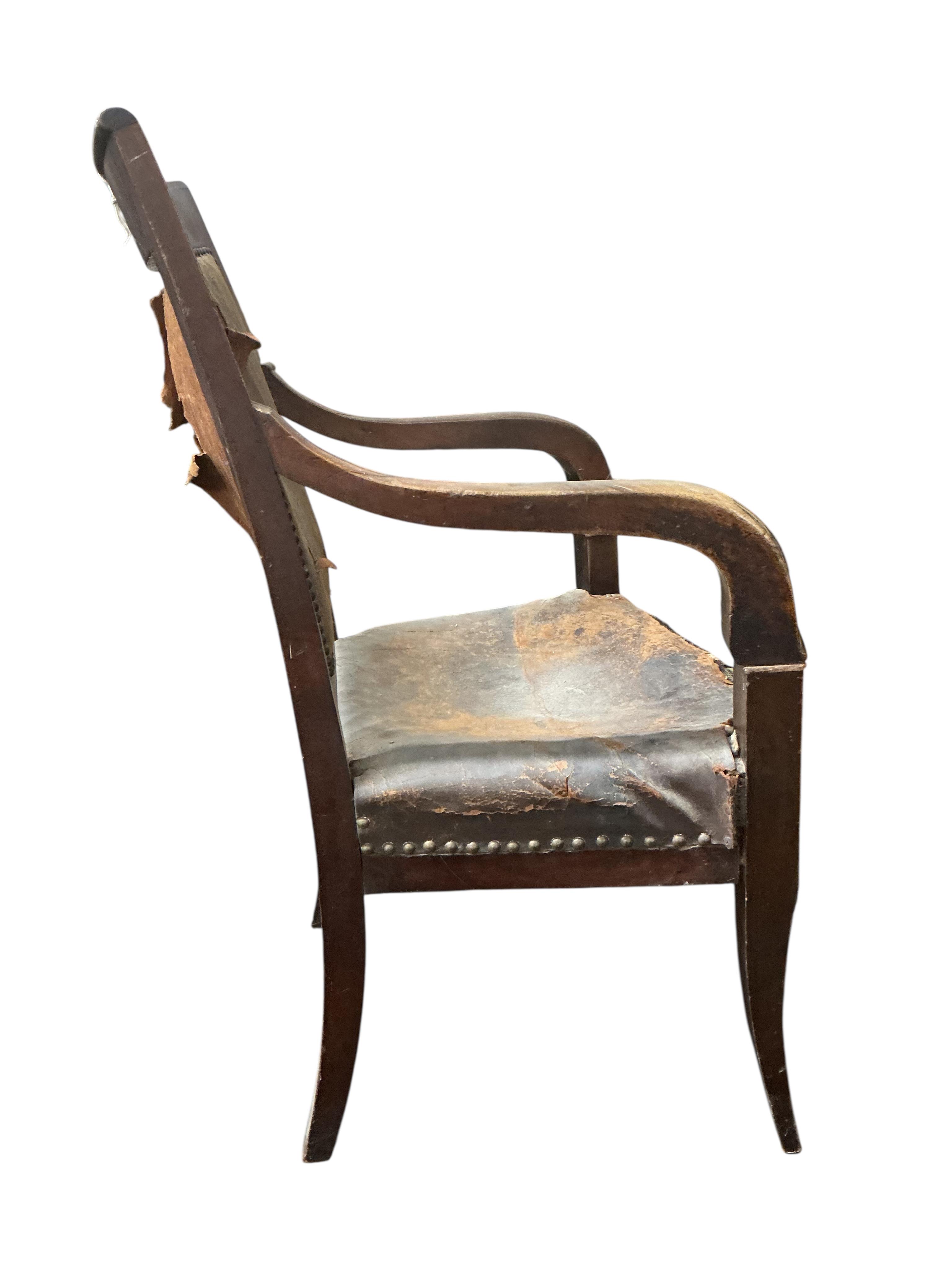 A 19th century French Empire mahogany fauteuil, (requiring restoration), width 59cm, depth 46cm, height 93cm